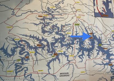 a map with a blue arrow pointing to the location
