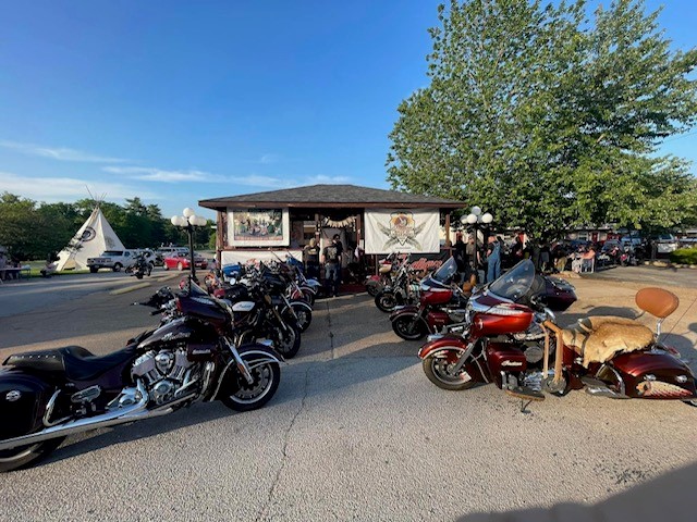 a group of motorcycles parked next to each other